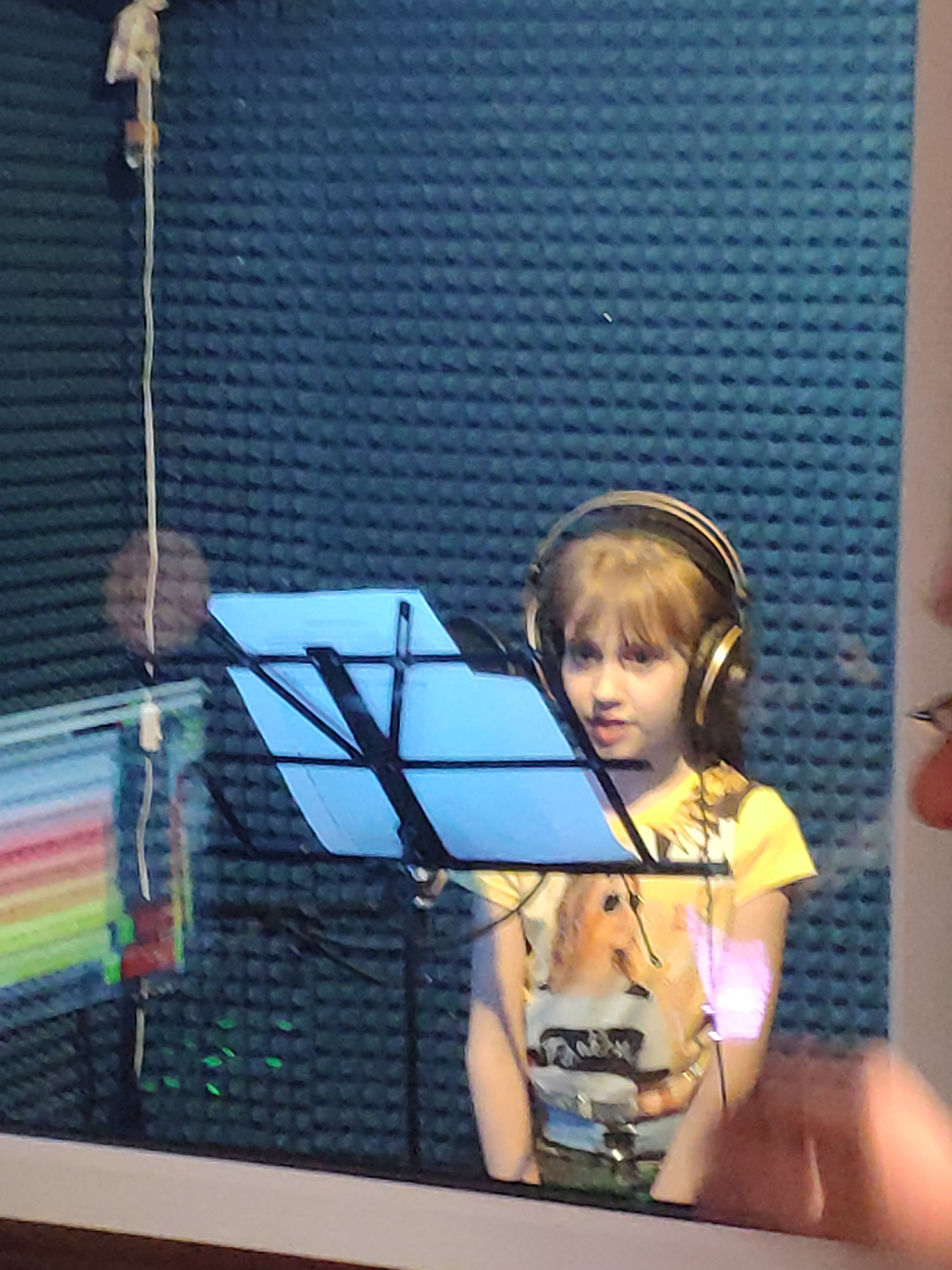 Amelina singing at an event